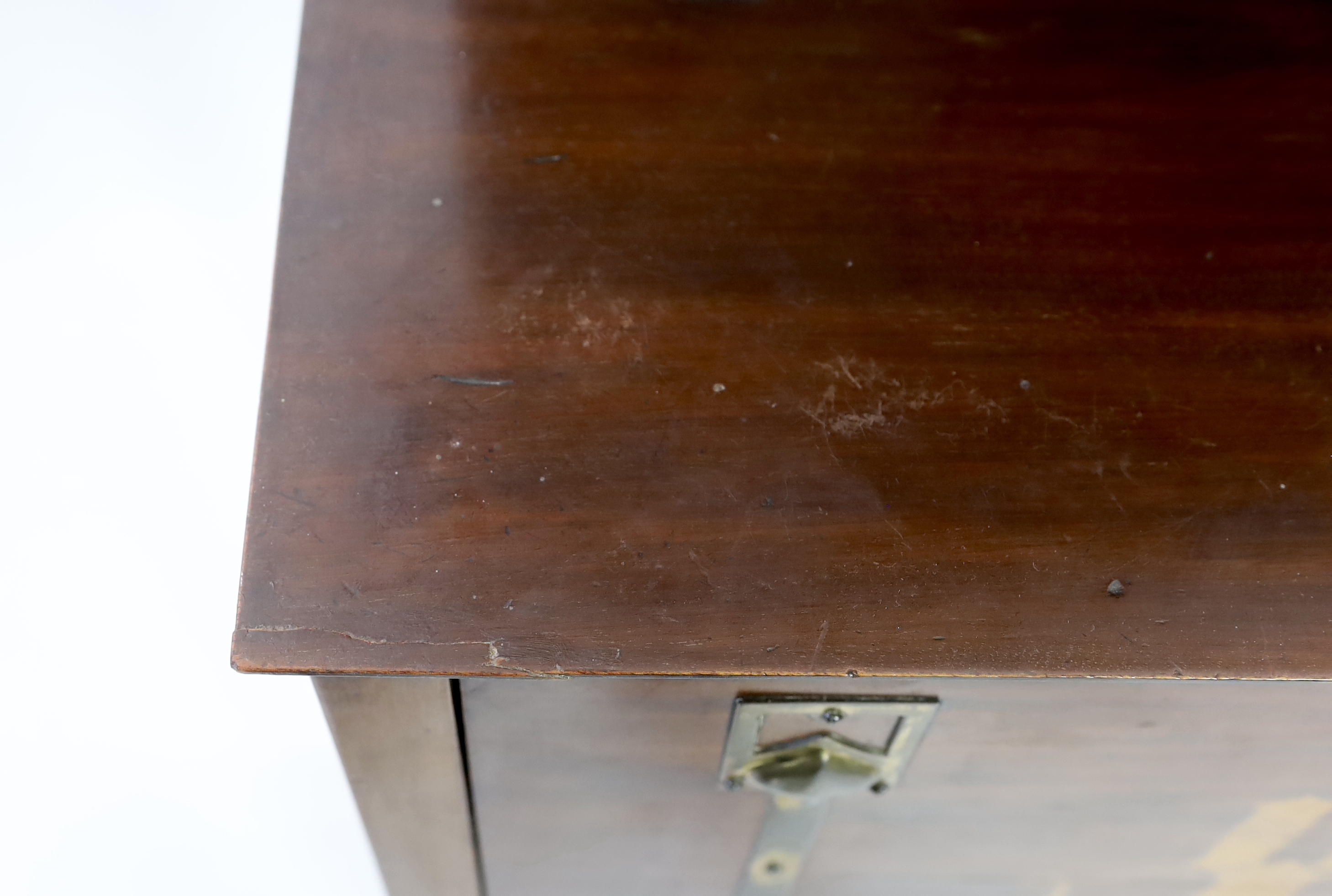 An early 20th century Arts & Crafts inlaid mahogany music cabinet, made by George Montague Ellwood and retailed by J.S. Henry of London